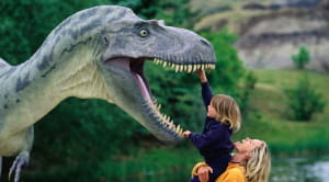 Mother and child with dinosaur